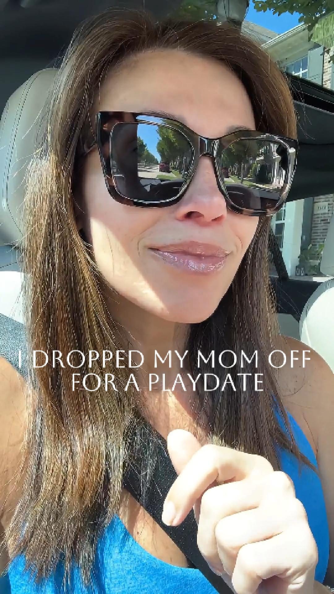 Selfie video still in the car with text: I dropped my mom off for a playdate.